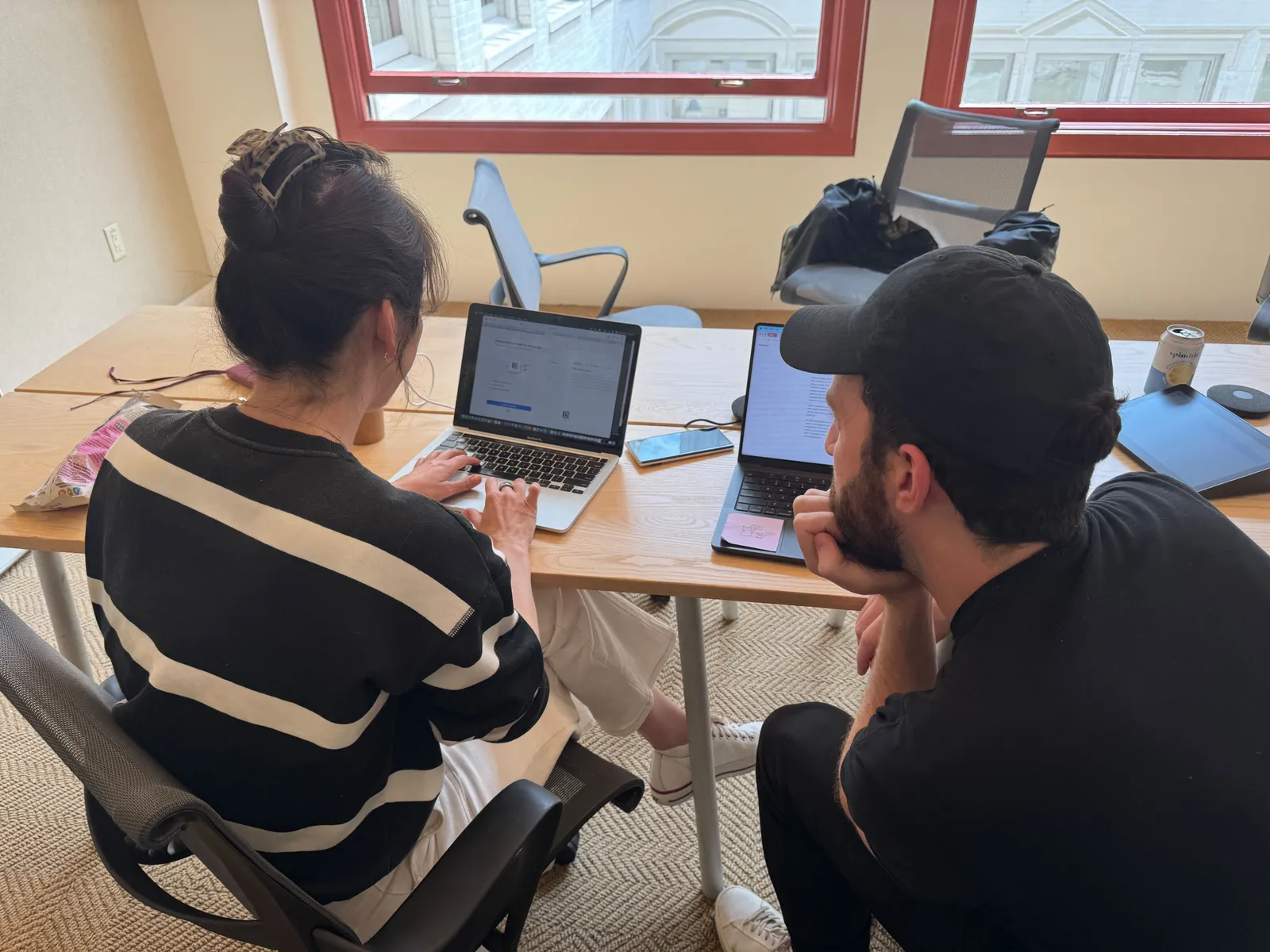 Image may contain Clothing Footwear Shoe Computer Electronics Laptop Pc Adult Person Chair and Furniture